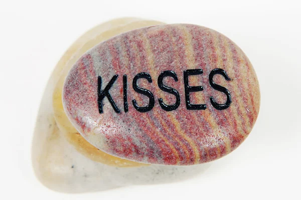 Kisses engraved on stone — Stock Photo, Image