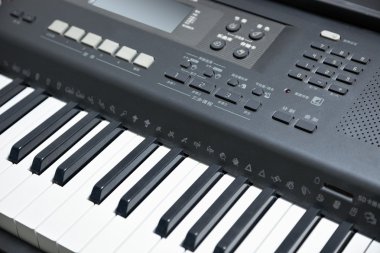 Electronic piano keyboard(part) clipart