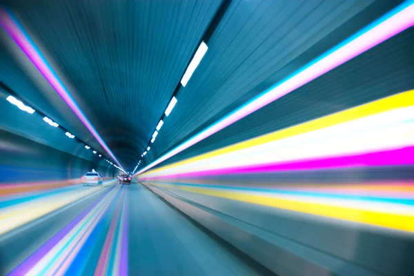 Abstract speed motion in urban highway road tunnel, blurred moti — Stockfoto