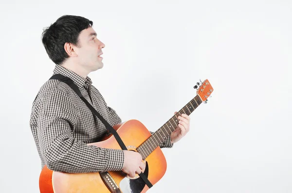 기타를 든 남자 스톡 사진