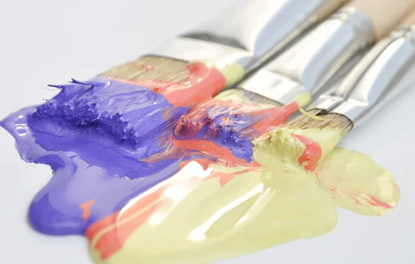 Paintbrushes and acrylic paint — Stock Photo, Image