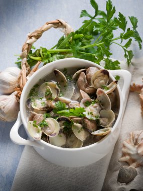 Clam soup with garlic and parsley clipart