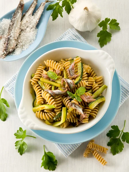Fusilli with anchovies and zucchinis — Stock Photo, Image