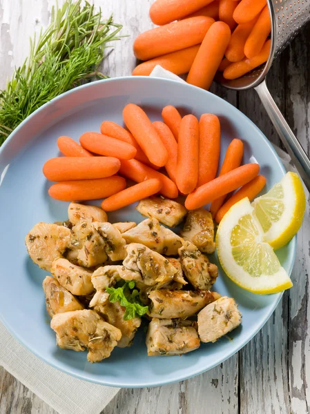 stock image Chicken stew with herbs and small carrots