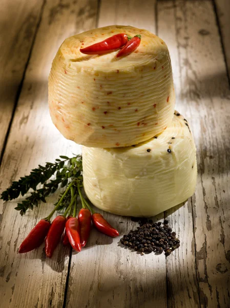 Italian cheese with hot chili pepper — Stock Photo, Image