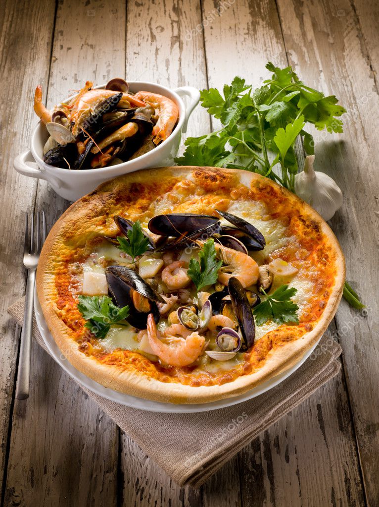 Pizza with sea fruits — Stock Photo © 9390608