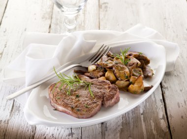 Grilled tenderloin with cep mushroom clipart