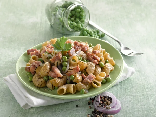 stock image Pasta with peas bacon and parsley