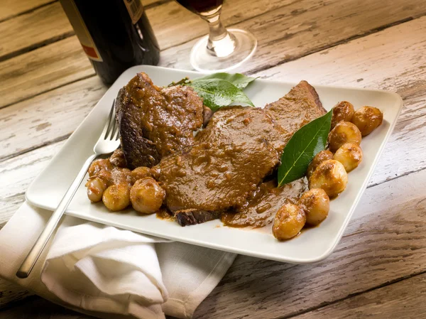 stock image Braised meat with onions