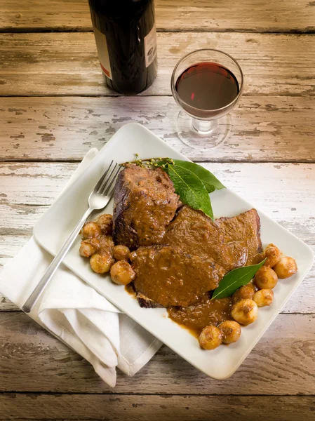 stock image Braised meat with onions