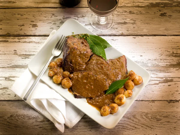 Stock image Braised meat with onions