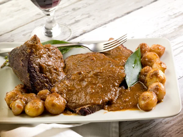 stock image Braised meat with onions