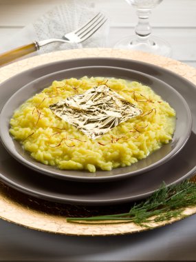 Saffron risotto with gold leaf (Gualtiero Marchesi's recipe) clipart