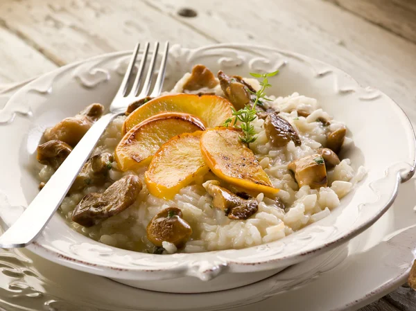Risotto with apple and cep edible mushroom — Stock Photo, Image