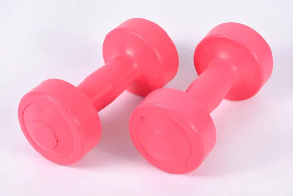 Stock image Pink dumbbells