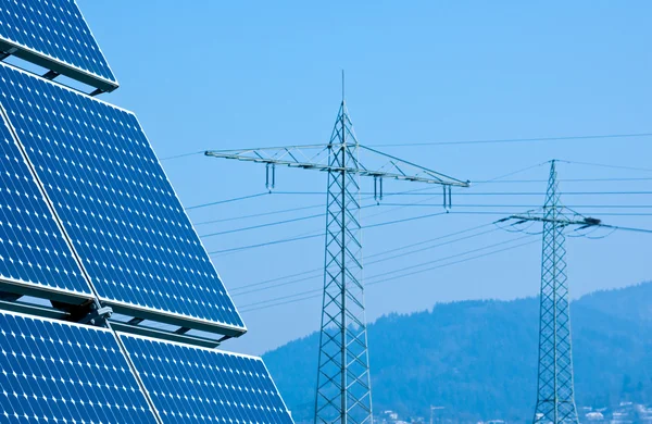 Solar Panel and High Voltage Tower — Stock Photo, Image