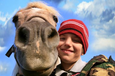 Boy and horse clipart