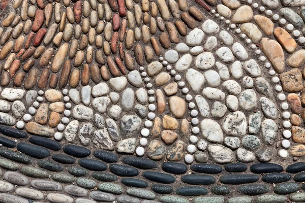 Texturerat pebble trottoaren — Stockfoto