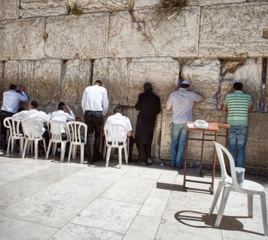 Jews at the wailing western wall in Jerusalem clipart