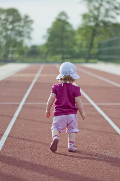 stock image Little girl on the treadmill