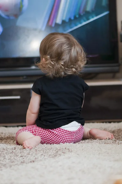 stock image Child watches television