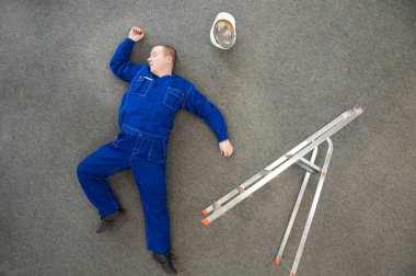 Worker fell from a ladder clipart