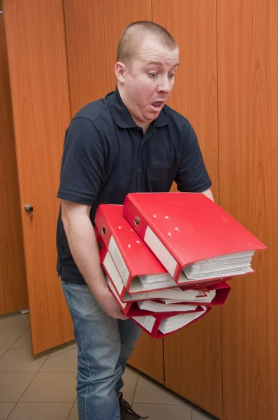 Man drops the binders — Stock Photo, Image
