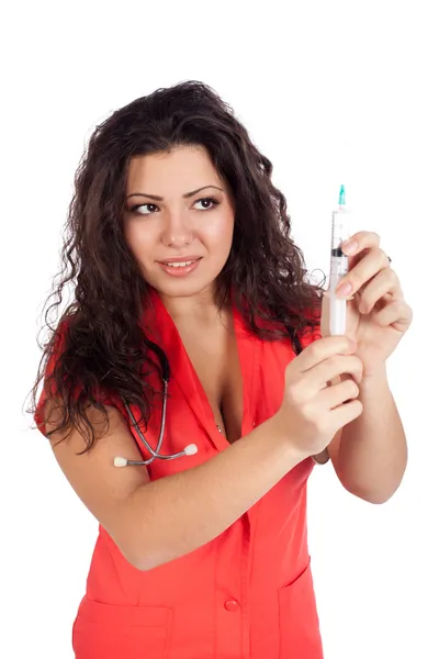 Infirmière attrayante ou femme médecin avec seringue Photos De Stock Libres De Droits