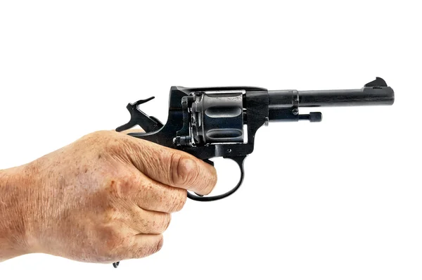 Револьвер в руке — стоковое фото
