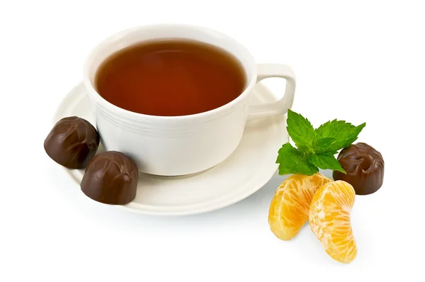 Čaj s bonbóny a mátou — Stock fotografie