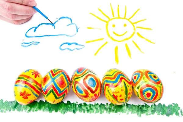 Photo de l'enfant par aquarelle : cinq œufs de Pâques sur une herbe , — Photo
