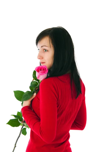 Het romantische meisje met een roze roos — Stockfoto