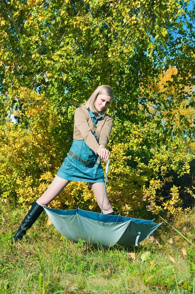 stock image Young woman posing near a tree