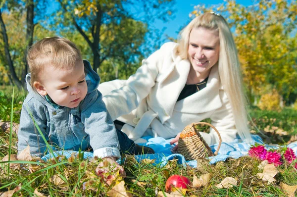 stock image The young woman with the son on walk