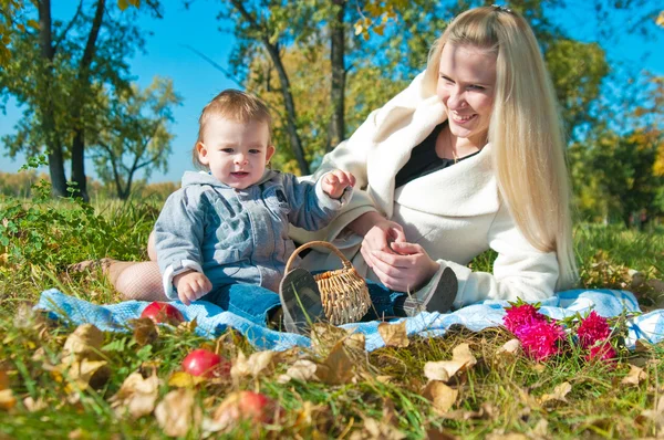 stock image The young woman with the son on walk