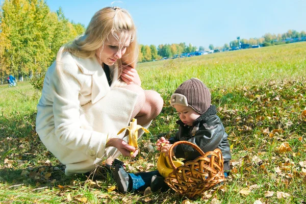 stock image The young woman with the son on walk