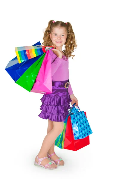 Ta dívka drží mnoho balíčků — Stock fotografie