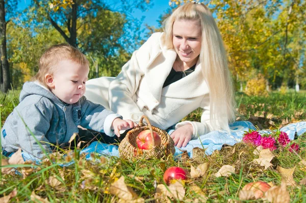 stock image The young woman with the son on walk