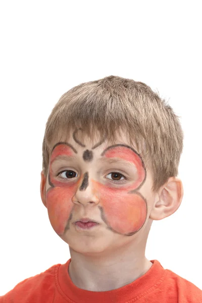 Pojke med fjäril i ansiktet — Stockfoto