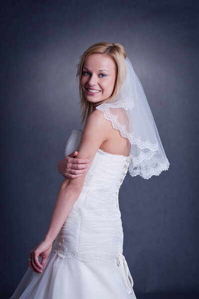 Young bride in wedding dress