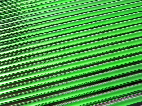 Grönt glas tube högen, solpanel Detaljer. — Stockfoto