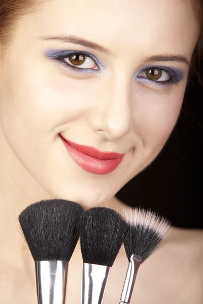 stock image Portrait of beautiful redhead girl with style make-up and brush.