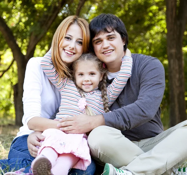 Young family at outdoor. — Stock Photo, Image