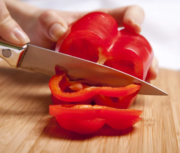 stock image Bulgarian pepper cutting