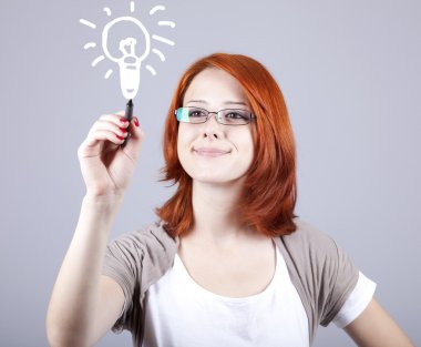 Young businesswomen with pen in hand clipart