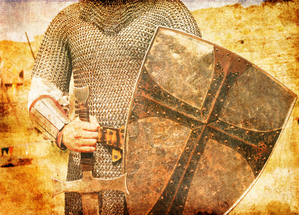 Photo of Knight and sword. Photo in old image style.