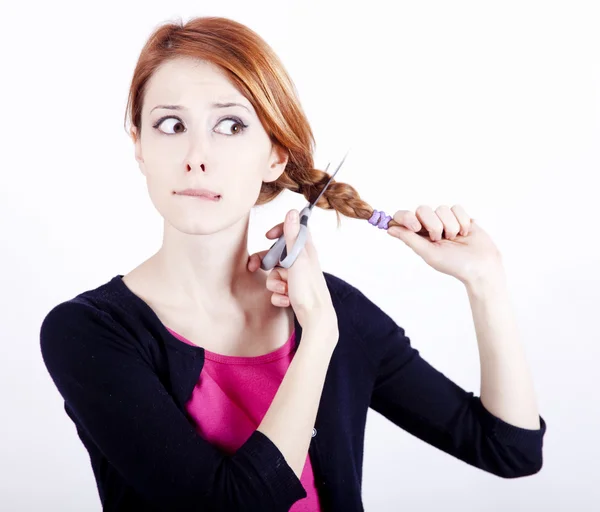 Redhead girl with scissors. — Stock Photo, Image