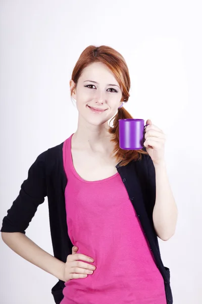 Portrait of red-haired girl with cup. — Stock Photo, Image