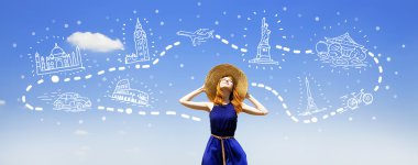 Redhead girl dreaming about traveling around the world. clipart