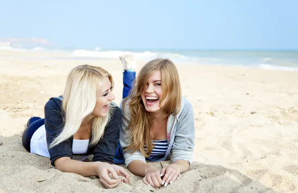 Two girls at outdoor near sea. — Stock Photo, Image